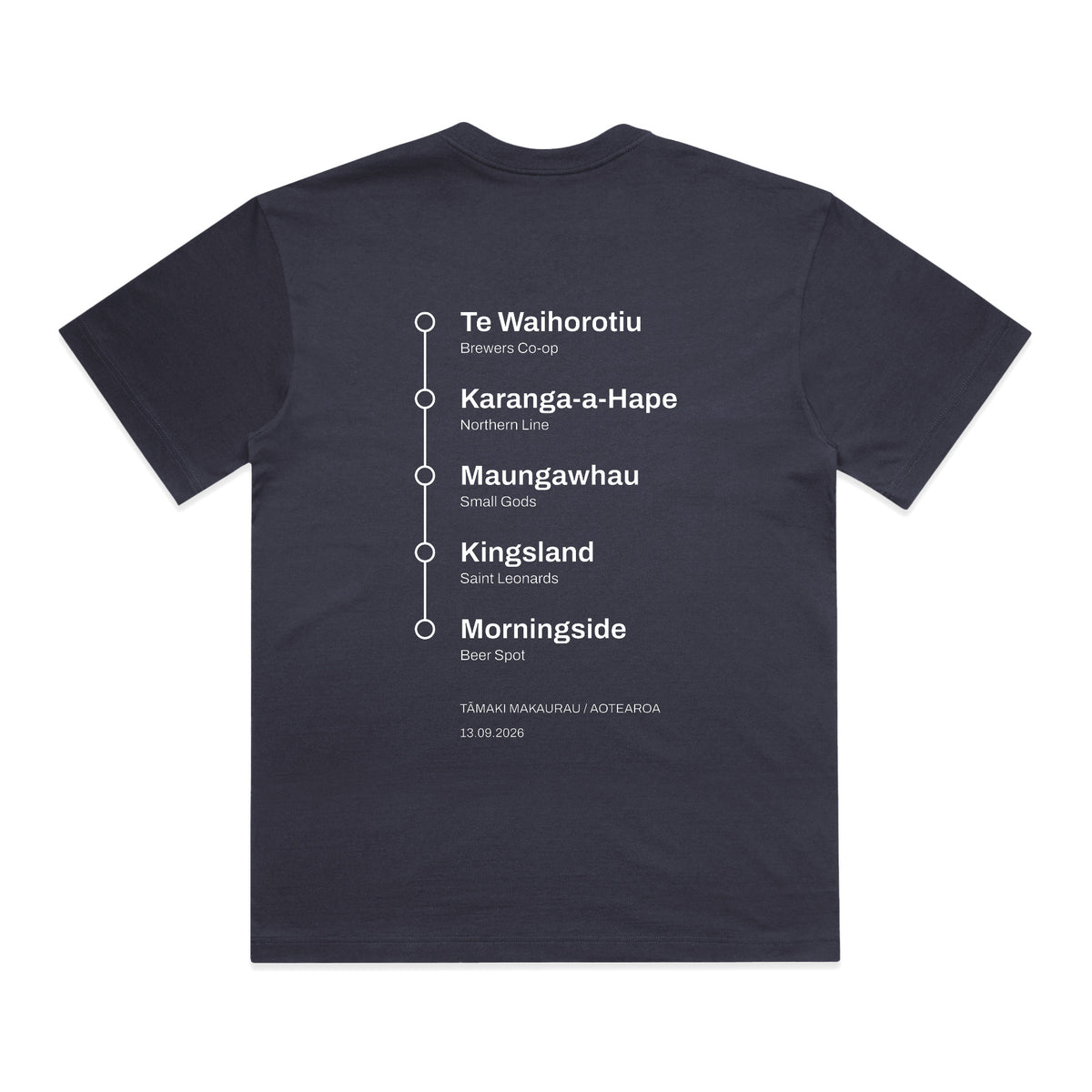 Back of the City Ale Link tee in ink blue: the five stations printed as a vertical white line with five circular stops, Te Waihorotiu, Karanga-a-Hape, Maungawhau, Kingsland and Morningside, each with its venue named beneath, above Tamaki Makaurau / Aotearoa and the date 13.09.2026.